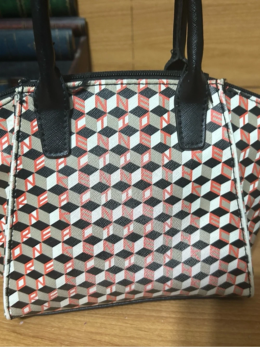 Kenneth Cole Reaction Women's Geometric Print handbag Black & orange